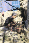 Old Woman Fetching Water