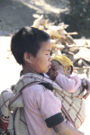 Child Holding Baby