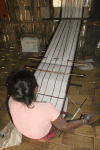 Woman Weaving Loom