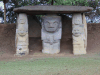 Stone Statues Guarding Grave