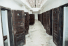 Hallway with doors to individual confinement cells in Terezin