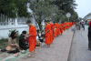Giving Alms Monks Main