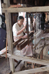 Older Woman Working Loom