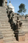 Stone Figures Flanking Steps