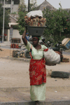 Woman Carrying Merchandise Head